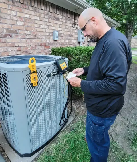 Checking out a customer's compressor during routine maintenance.